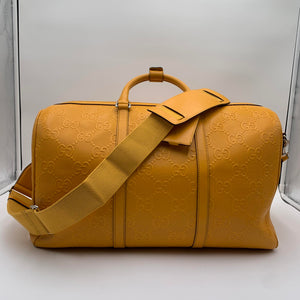 Gucci Yellow Duffle Bag