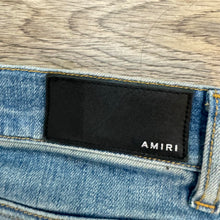 Load image into Gallery viewer, Amiri Camo Logo Jeans